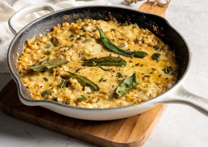 vegan cheesy haricot beans and leeks skillet made with vegan cheese