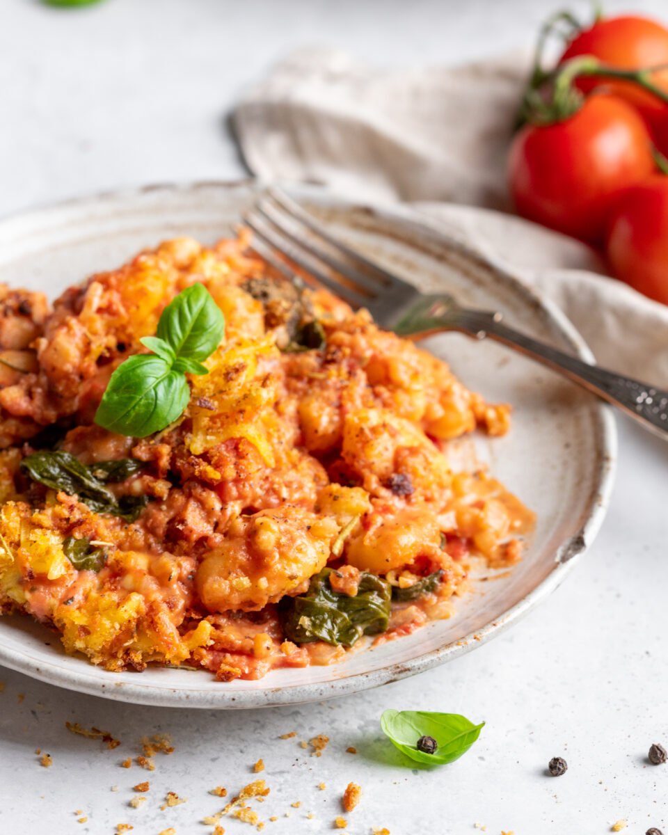 a plate of creamy one-pot gnocchi bake close up