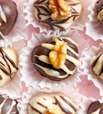 a picture of rows of heart-shaped chocolate truffles that are vegan
