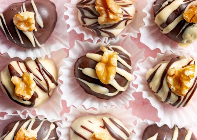 a picture of rows of heart-shaped chocolate truffles that are vegan