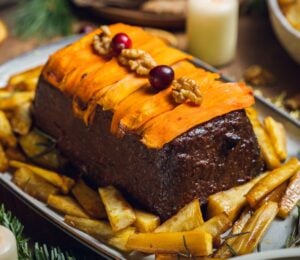 a picture of a lentil and walnut loaf with cranberry glaze made with lentils, walnuts, cranberries, and orange