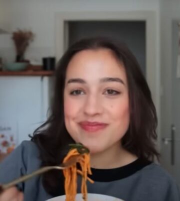 YouTuber Mina Rome in a still from a video on easy vegan meals