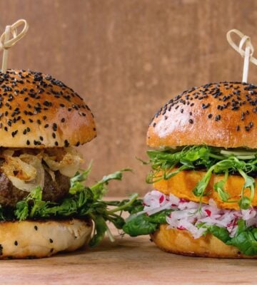 Photo shows a traditional meat-based burger (left) and a plant-based burger (right) side by side