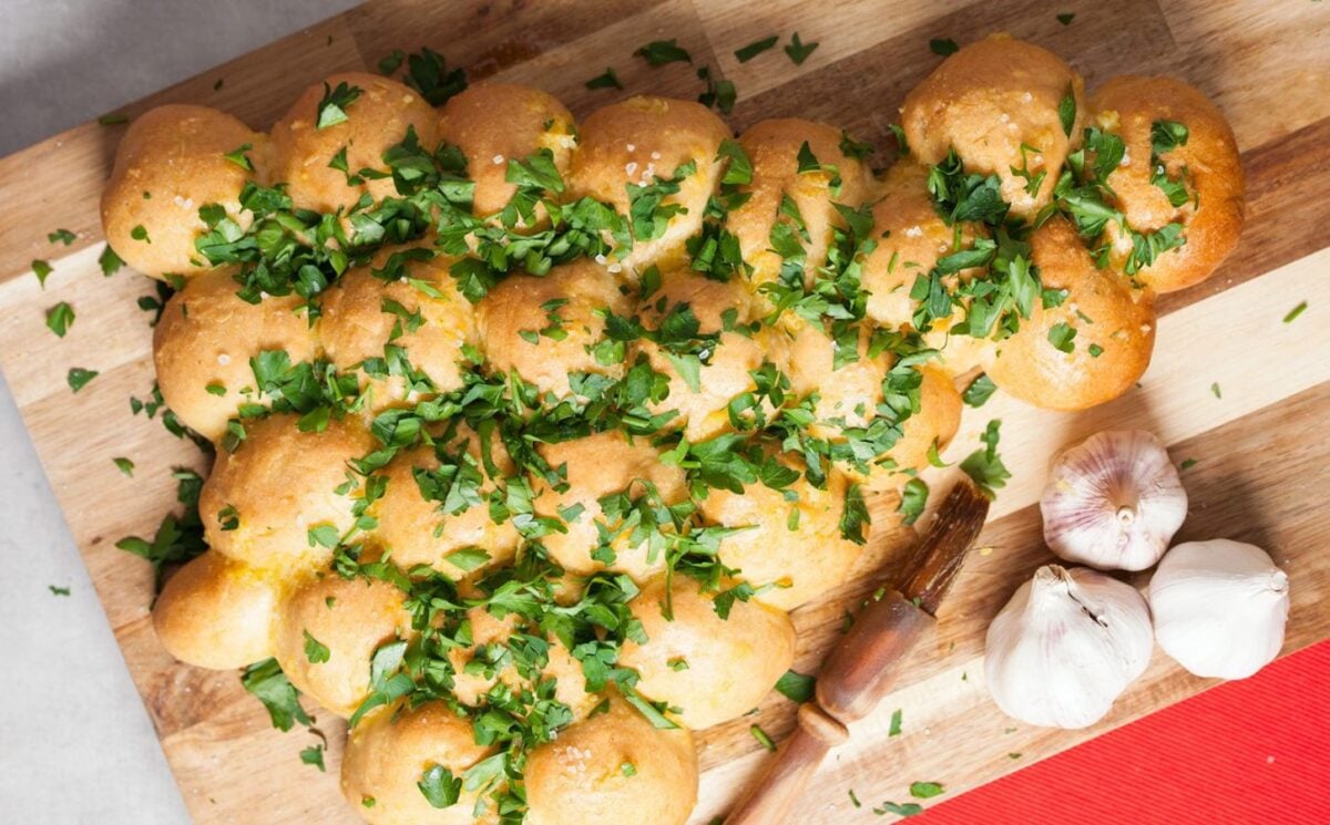 a picture of a Christmas tree garlic bread sharer that pairs well with other vegan recipes to serve at your Christmas party