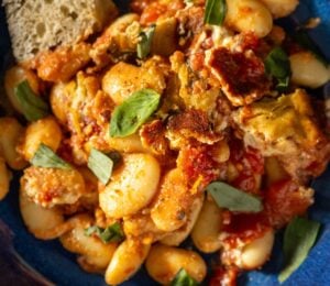 A high protein vegan bean bake on a blue plate