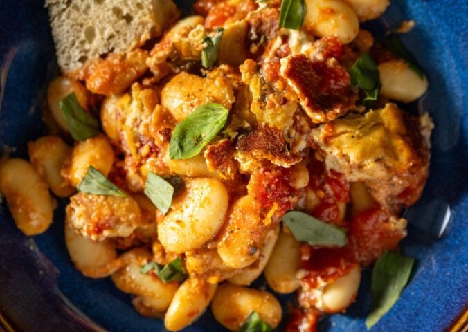 A high protein vegan bean bake on a blue plate