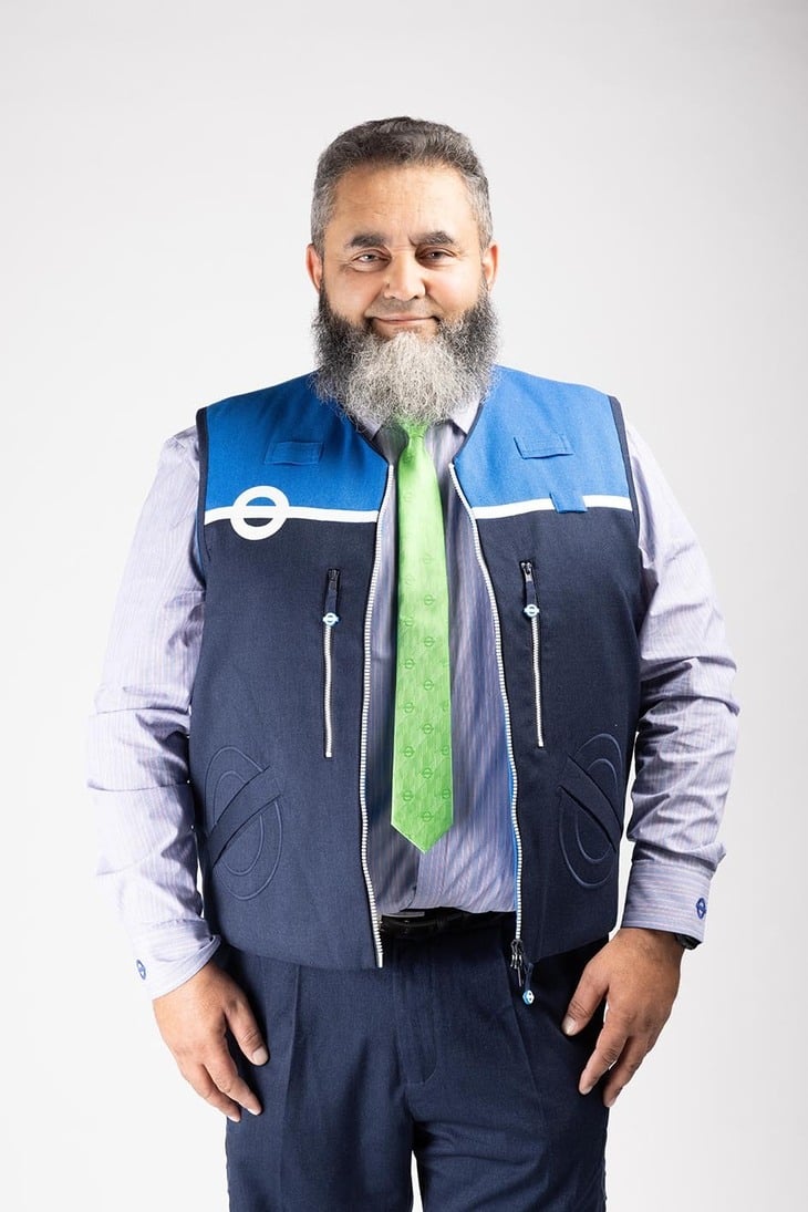 A TfL (transport for London) worker wearing the new sustainable uniform