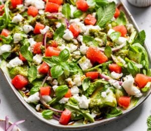 a vegan watermelon and feta salad made with cucumber and rocket