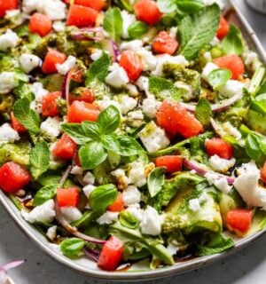 a vegan watermelon and feta salad made with cucumber and rocket