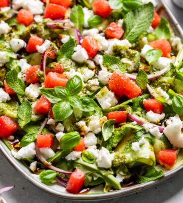 a vegan watermelon and feta salad made with cucumber and rocket