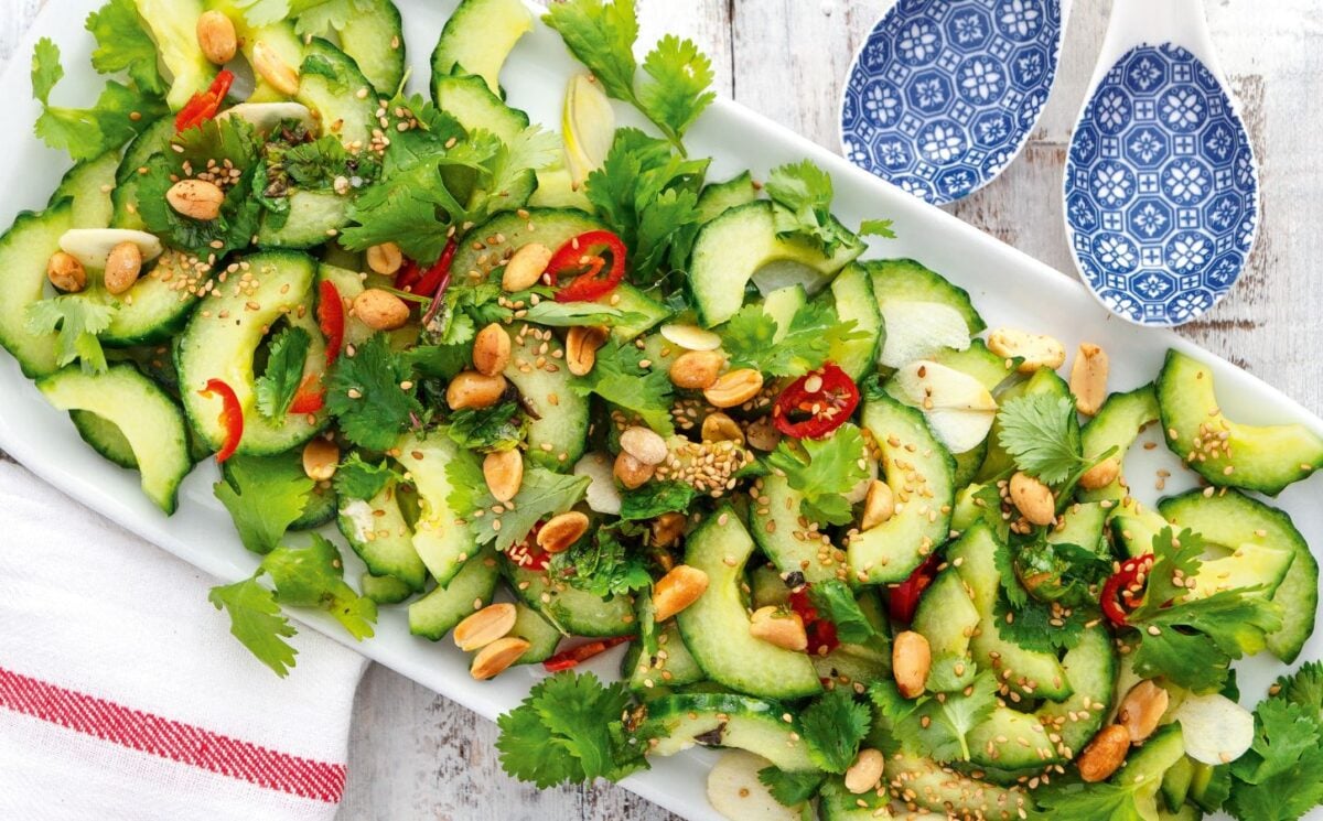 a platter of Vietnamese cucumber salad with Thai red chili and peanuts