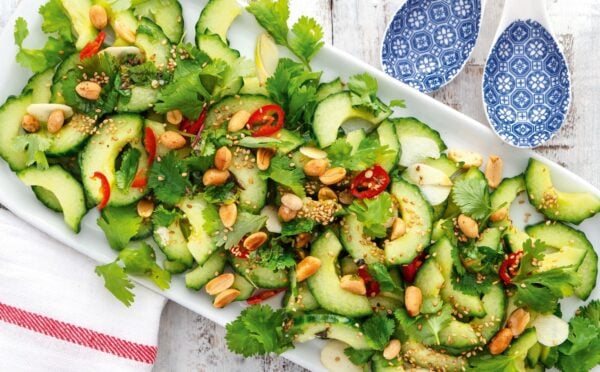 a platter of Vietnamese cucumber salad with Thai red chili and peanuts