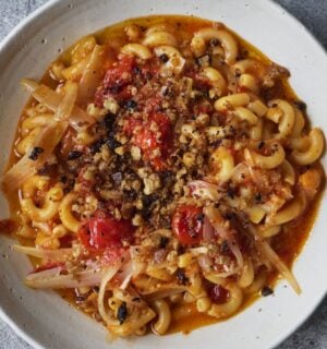 a bowl of balsamic tomato macaroni with olive pangrattata