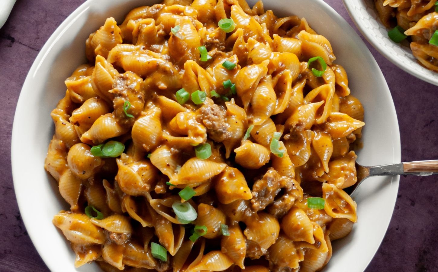 a bowl of cheezy hamburger shells a vegan version of hamburger helper