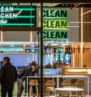 Photo shows a group of people inside Clean Kitchen Club's Battersea location