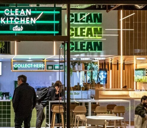 Photo shows a group of people inside Clean Kitchen Club's Battersea location