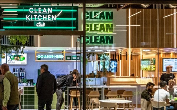 Photo shows a group of people inside Clean Kitchen Club's Battersea location