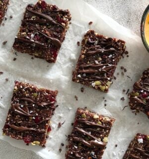 A selection of cranberry breakfast bars, a vegan post-workout snack