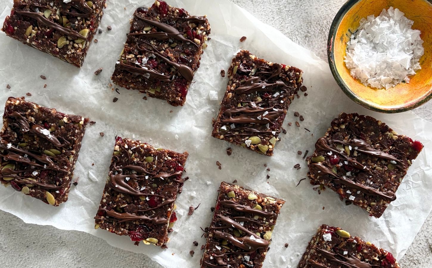 A selection of cranberry breakfast bars, a vegan post-workout snack