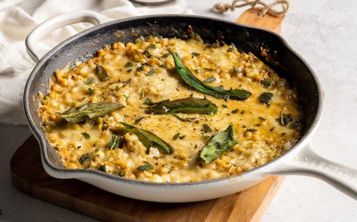 A skillet full of cheesy beans, an easy one-pot vegan recipe