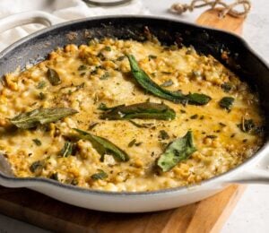 A skillet full of cheesy beans, an easy one-pot vegan recipe