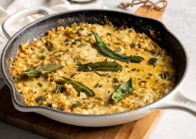 A skillet full of cheesy beans, an easy one-pot vegan recipe