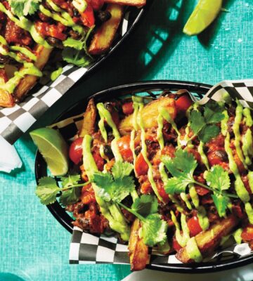 Two baskets of pulled aubergine and black bean loaded fries