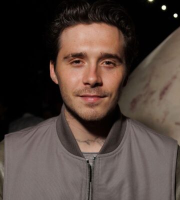 A close-up shot of Brooklyn Beckham at a fashion show