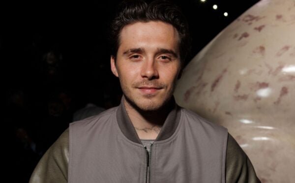 A close-up shot of Brooklyn Beckham at a fashion show