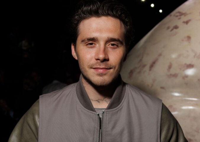 A close-up shot of Brooklyn Beckham at a fashion show