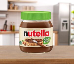 A tub of vegan Nutella on a kitchen surface