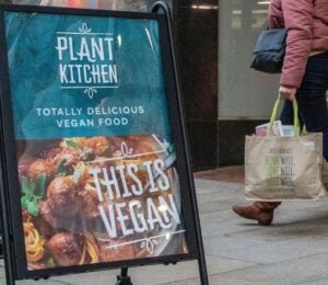 A sign for M&S Plant Kitchen, the supermarket's vegan food brand, outside a Marks and Spencer store