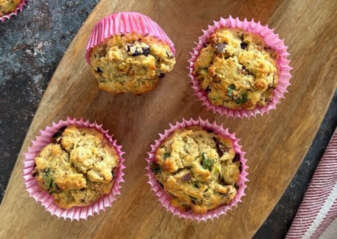 Four vegan breakfast muffins in pink casing