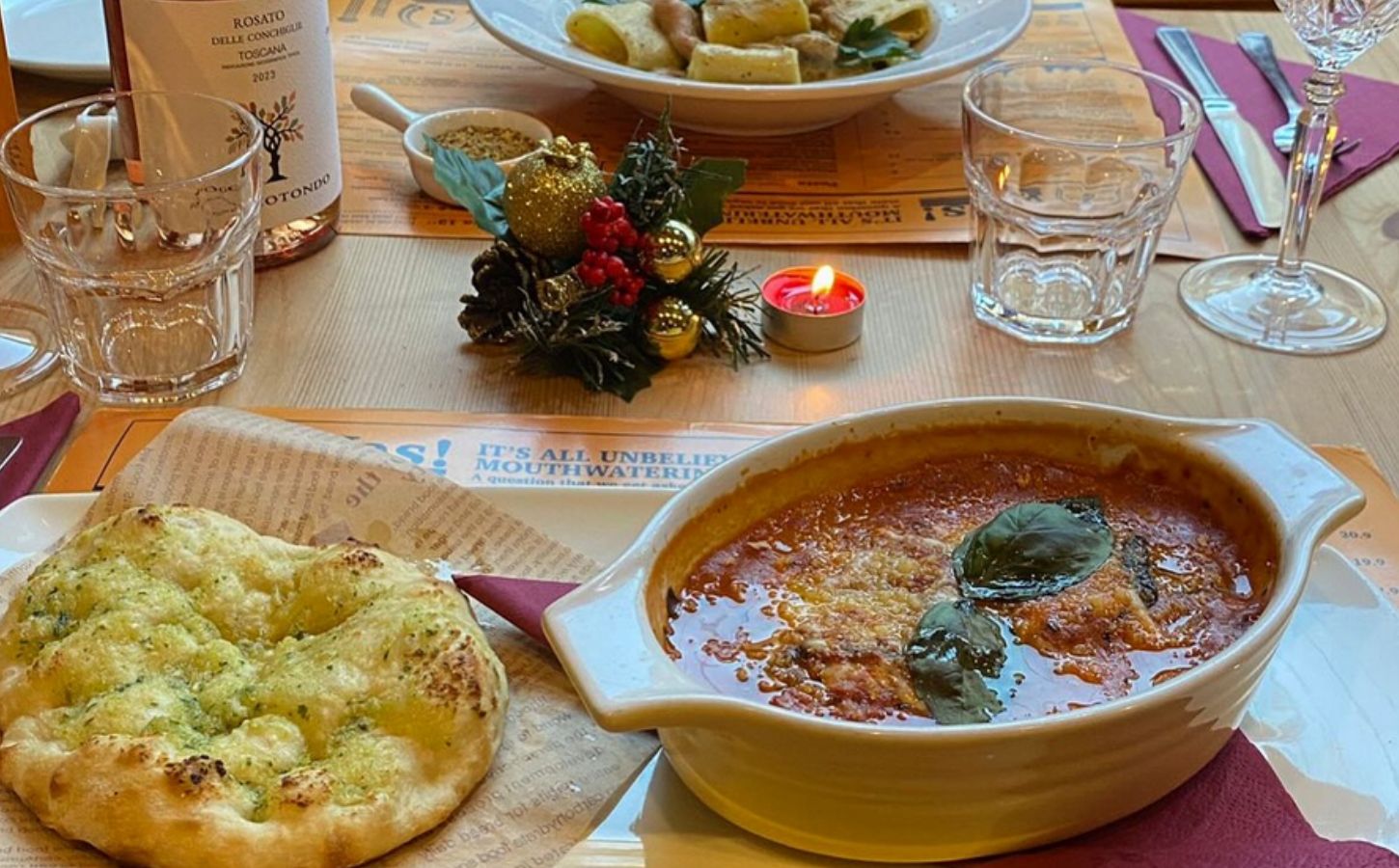 Photo shows several dishes from the vegan Italian restaurant Sora Lella on a table