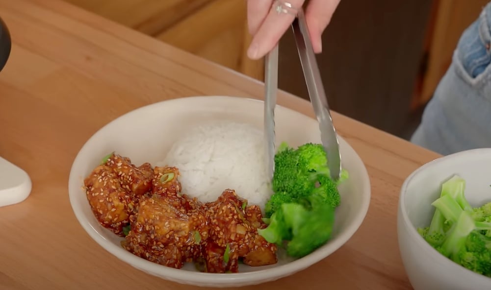 A bowl of sticky sesame tofu, a simple vegan tofu recipe