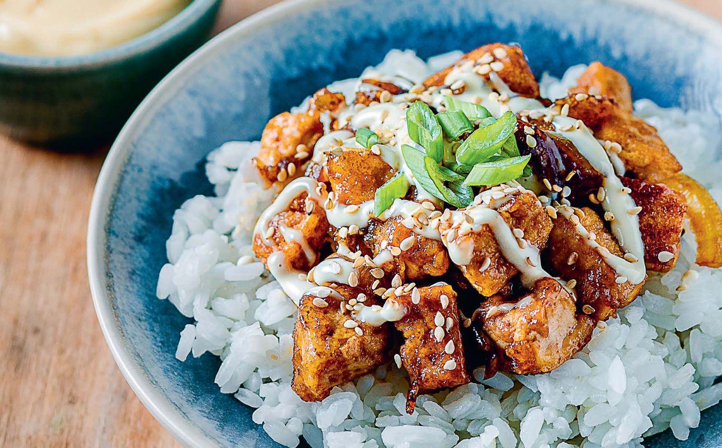 a bowl of vegan teriyaki tofu don, a Japanese dish made plant-based with tofu