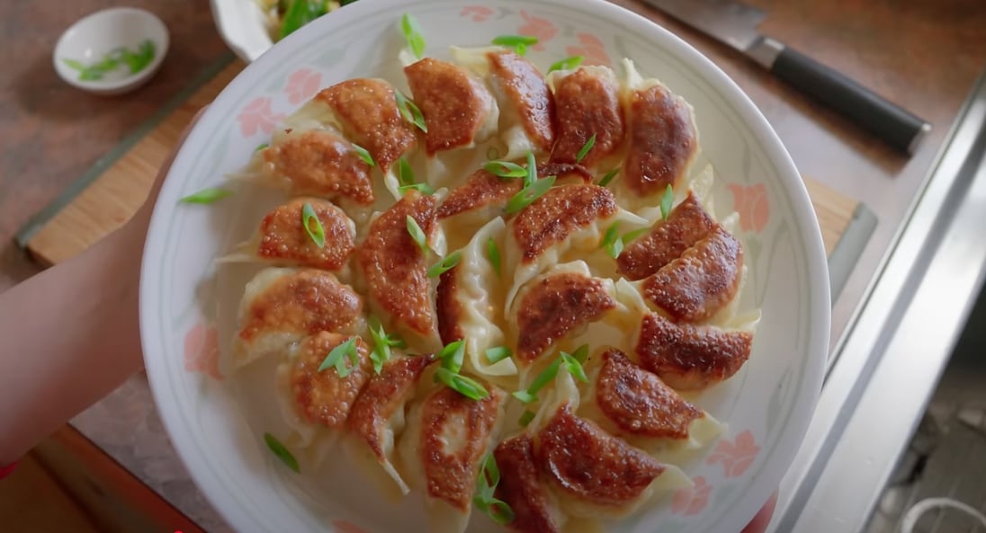 A plate of tofu and vegetable gyozas