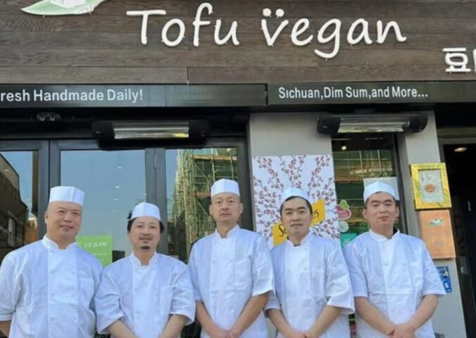 Tofu Vegan chefs standing outside one of the London restaurants