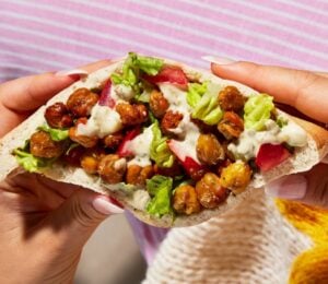 vegan lunches to make when working from home featuring a chickpea pitta pocket