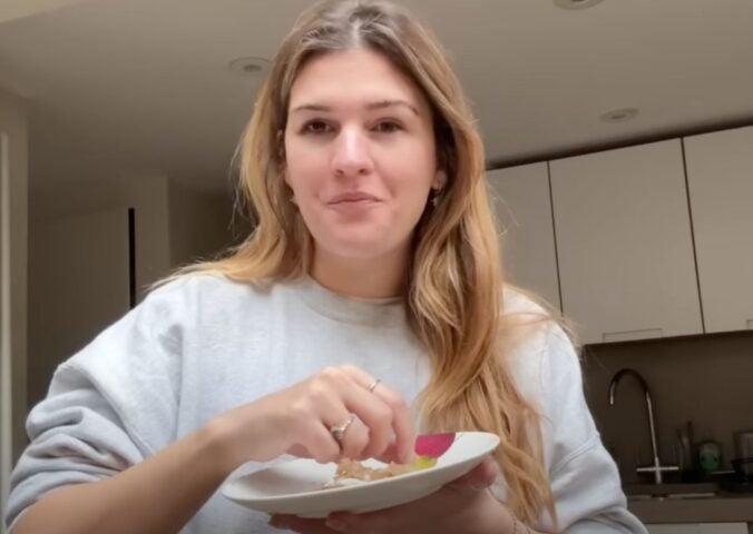 A still of Nicole Whittle, also known as Vegan Beauty Girl, from a recent video on accessible vegan meals