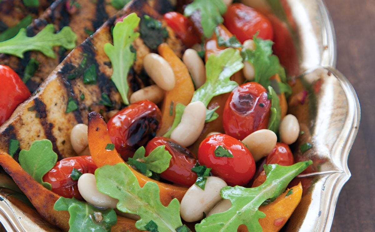 a platter of balsamic tofu with white bean sauce and agave pumpkins