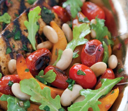 a platter of balsamic tofu with white bean sauce and agave pumpkins