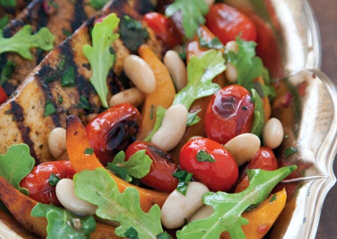 a platter of balsamic tofu with white bean sauce and agave pumpkins