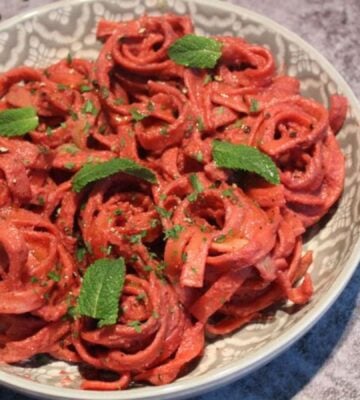 A dish of creamy vegan beetroot pasta