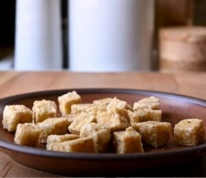 A vegan crispy tofu recipe in a bowl