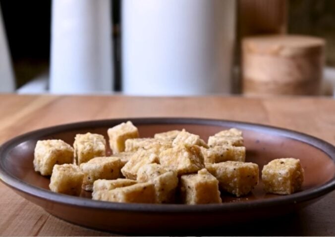 A vegan crispy tofu recipe in a bowl