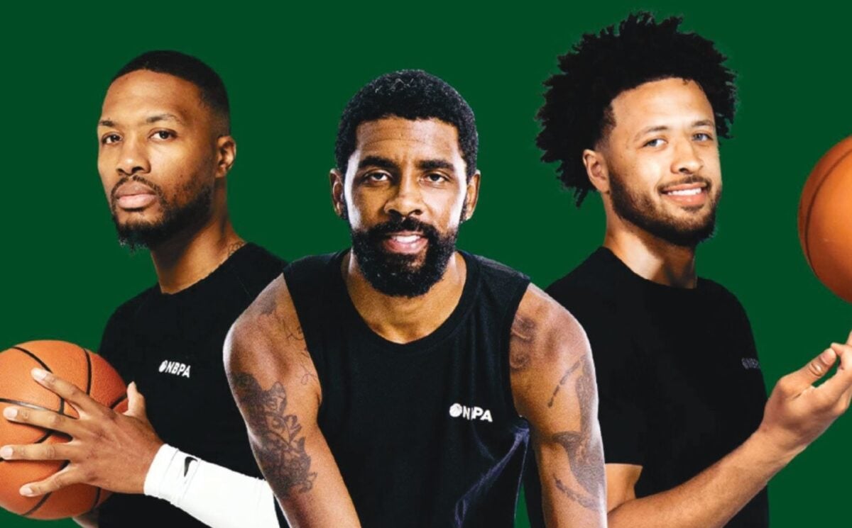 Three basketball players in a close-up of a plant-based cookbook from Beyond Meat