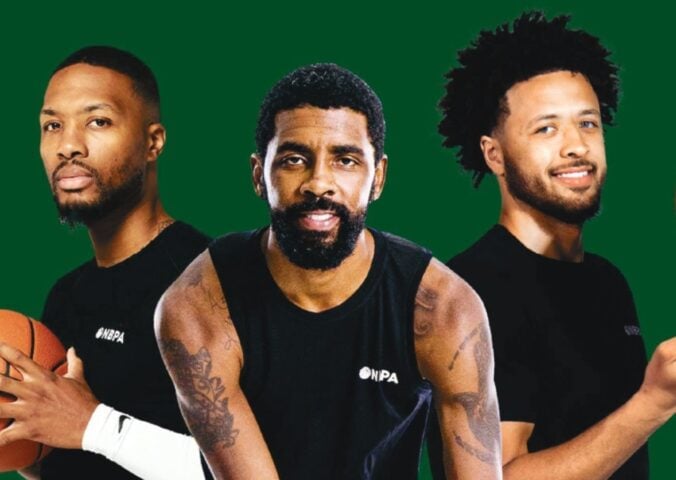 Three basketball players in a close-up of a plant-based cookbook from Beyond Meat