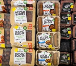 Photo shows a selection of Beyond Meat products in a large refrigerator