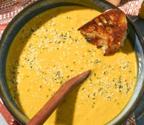 a vegan broccoli cheddar soup with bread